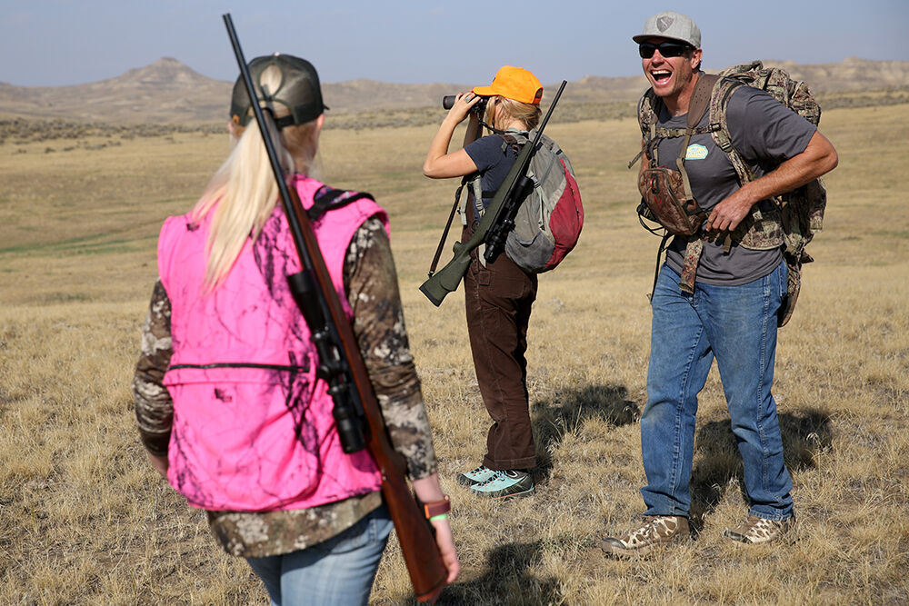 Guide Matt Bowers lets out a laugh after the group accidentally